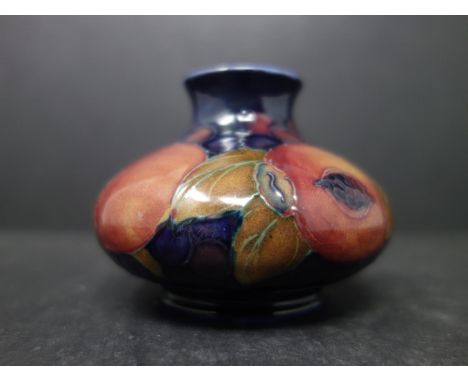 An early 20th century Moorcroft Pomegranate miniature squat vase, by William Moorcroft, circa 1900-1923, H.6cm 