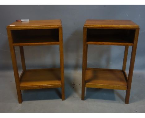 A pair of oak lamp tables, having shelf and undertier raised on square legs, H.70 W.42 D.33cm 