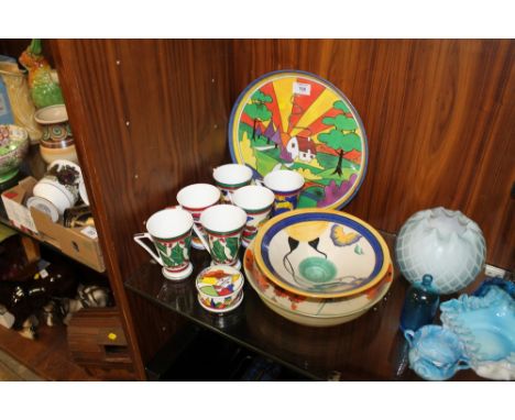 A COLLECTION OF MODERN CLARICE CLIFF STYLE CERAMICS TO INCLUDE MUGS ETC