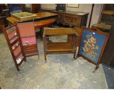 A VINTAGE OAK FRAMED FIRESCREEN, FOLDING SEWING BOX AND AN OAK TROLLEY (3)