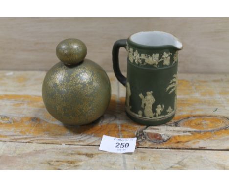 A ROYAL WORCESTER GOLD OVERLAY FLASK TOGETHER WITH A WEDGWOOD JUG