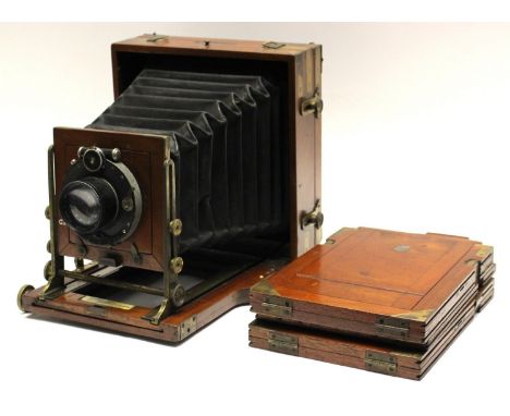 James Lancaster: A James Lancaster of Birmingham, half plate camera and lens, with further plates in original case.