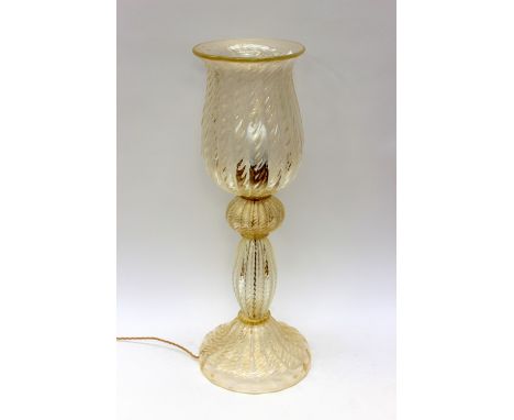 A large Murano glass lamp base, circa 1960s, optic moulded with gold aventurine inclusions throughout, 76cm high