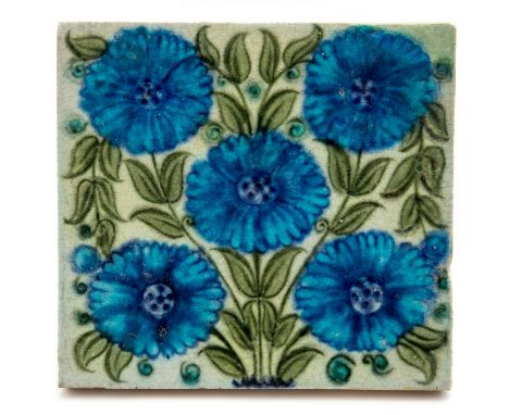 William De Morgan for Sands End Pottery, a Persian style tile, blue  daisies on green foliage, impressed marks, 15.5cm x 16.5