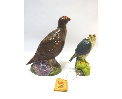 Famous Grouse finest Scotch Whisky in Royal Doulton Grouse decanter with swing label, no proof or contents given, H24cm & Whi
