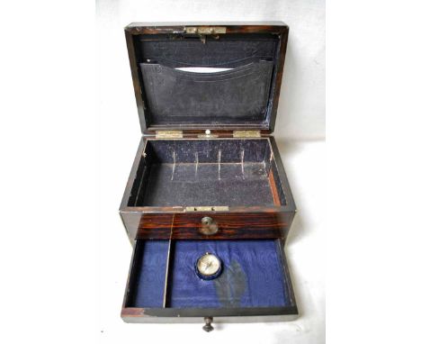 A late Victorian/early 20th century, Coromandel Stationery Box, brass bound corners, hinged lid opens to reveal a hide covere