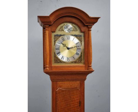 Alan Grainger (Acorn Man) of Brandsby, an oak Longcase Clock, typical form, arch top dial, brass with silvered chapter ring, 