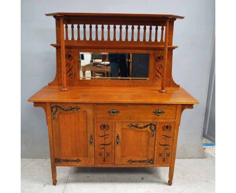 A good quality early 20th century Arts and Crafts oak Mirrored Back Sideboard, possibly by Maple &amp; Co., flat canted mould