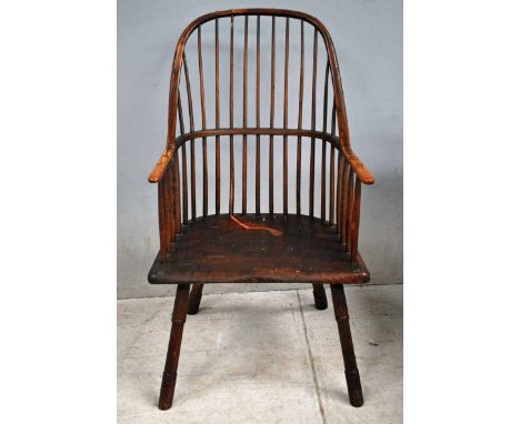 A 19th century Ash and Elm Stick Back Windsor Chair, hooped back and arms, saddle seat on splayed turned legs  