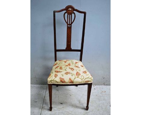 An Arts and Crafts Mahogany Bedroom chair, arched back rail, pierced central splat in organic design with mother of pearl and