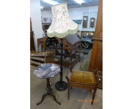 A Victorian mahogany piano stool, a mahogany barleytwist standard lamp and a  New York print occasional table 