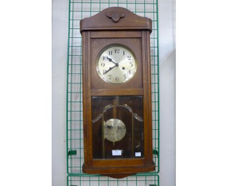 An oak wall clock 