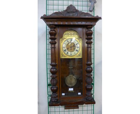 A 19th Century walnut Vienna wall clock 
