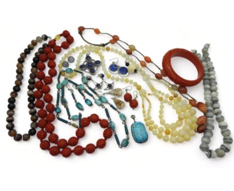 Cinnabar style bangle, earrings and beads, silver and lapis lazuli items, an Arabic silver mounted turquoise scarab beetle pe