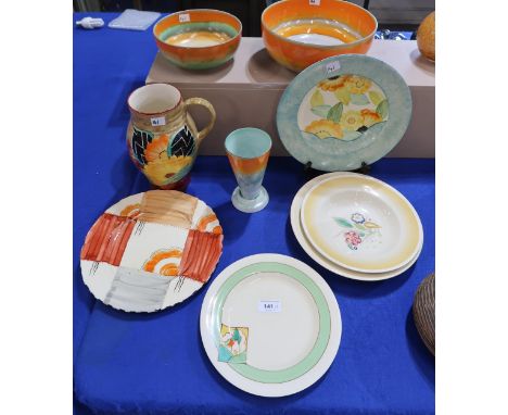 A collection of Art Deco pottery including Shelley bowls and vase, Crown Devon jug and plate, two Gray's plates, Susie Cooper