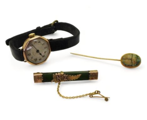 A 9ct gold cased Ingersoll watch, together with a 9ct gold mounted New Zealand jade brooch, together with a yellow metal moun