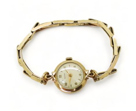 A 9ct gold ladies Rotary watch and strap hallmarked London 1960, weight without mechanism 9gms Condition Report:Available upo