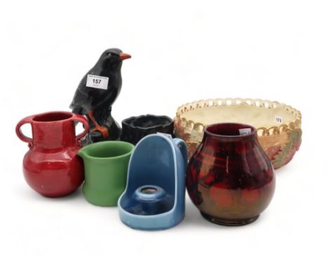 A red glazed two handled Liberty pottery vase, a Royal Worcester vine moulded bowl, a&nbsp; Phoenix Ware flambe glazed vase, 