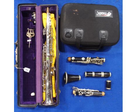 C.G. CONN a white metal soprano saxophone  Made by C.G. CONN ELKHART IND. U.S.A. PATD. DEC. 8. 1914 1119954 0 M142892 L with 