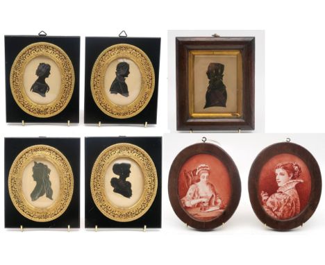 A 19th century silhouette portrait miniature of a lady in profile, housed in a rosewood frame, together with four 20th centur