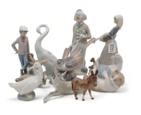 A collection of Lladro and Nao figures including animals and birds and other figures&nbsp; Condition Report:Available upon re