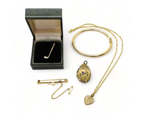 A collection of 9ct gold and yellow metal items to include a bangle, Ward brothers pearl brooch, heart shaped locket and chai