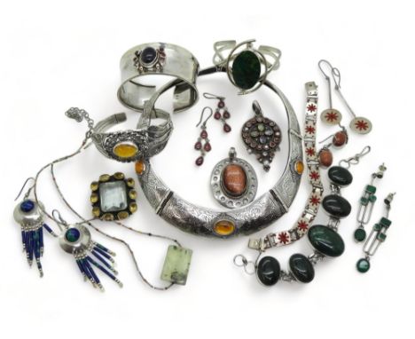 A collection of gem set silver jewellery to include an amber torc style necklace and similar bracelet, a silver cuff bangle s