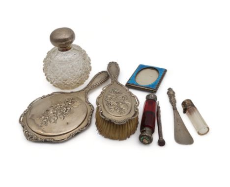 A collection of silver including a part dressing set, by Henry Matthews, Birmingham, decorated with floral bouquets, with scr
