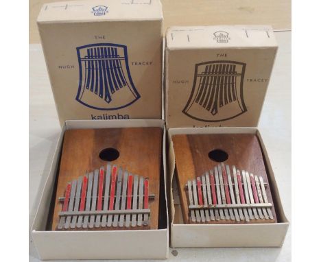 A lot comprising an alto Kalimba together with a treble Kalimba by Hugh Tracey South Africa circa 1966 with original box and 