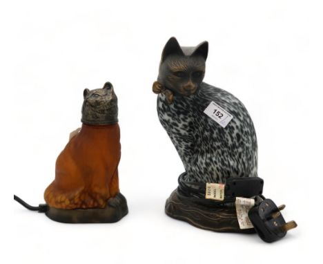 A glass and metal cat lamp with black and white mottled effect and another in amber glass Condition Report:Available upon req