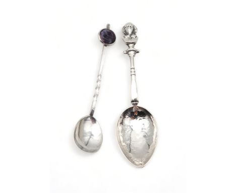 An Arts and Crafts silver spoon, by Winifred King &amp; Co, Birmingham 1927, with a hammered and pointed oval bowl, with a fi