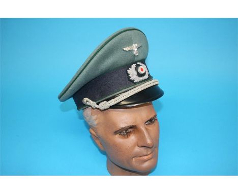A German Army Administration Officer's visor cap, stamped Stirndruckfrei Deutsches Reichspatent