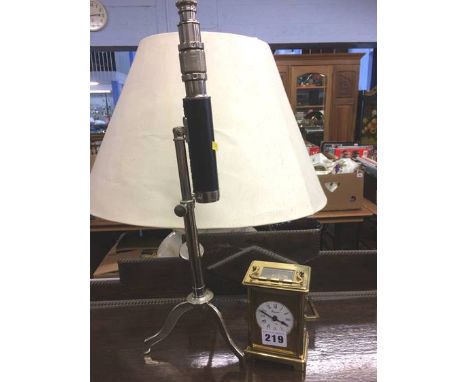 Telescope and a carriage clock