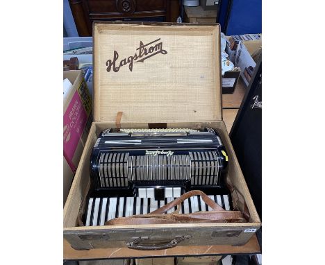 A cased Hagstrom accordion