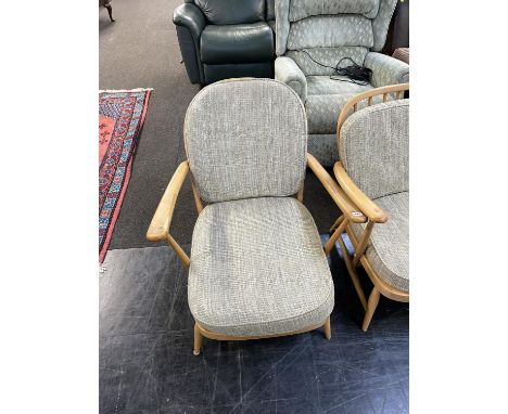 An Ercol spindle back Golden Dawn three armchair
