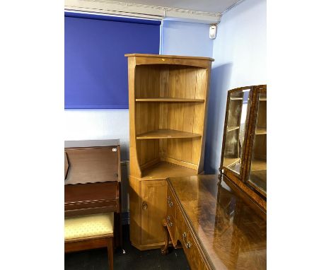 An Ercol Golden Dawn corner cabinet