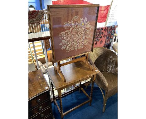 An oak rectangular occasional table, H 72cm and needlework fire screen, plus a Lloyd Loom chair