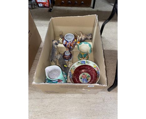 A box of ceramics and ornaments including a Ducal Ware jug, Maling lustre bowl and dog ornaments