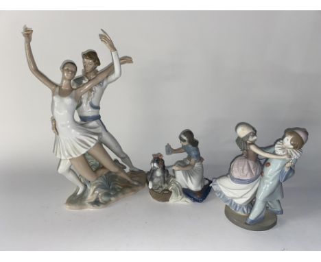 A Lladro porcelain figure group depicting 'Masquerade Ball', H 24cm another Lladro figural ornament and a Nao study of Dancer