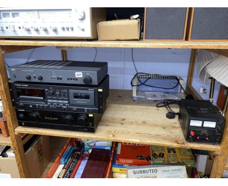 A Tascam CD-A500 CD player/cassette deck, a Pioneer stereo amplifier and a NAD stereo integrated amplifier, together with a F