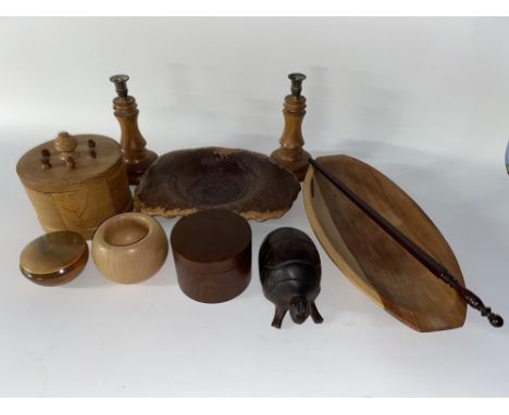 An oak lidded thread spool holder, H 21cm and a selection of other wooden items, including candlesticks and boxed gavel