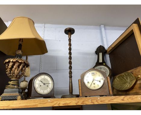 An Art Deco oak cased mantel clock, barometer, table lamps and other items