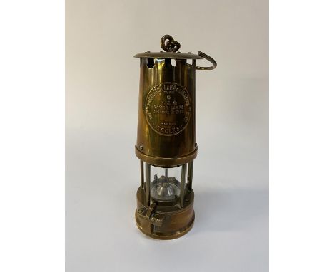A brass cased Eccles Miner's lamp, H 25cm