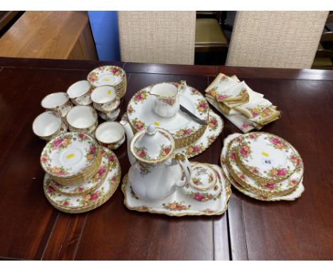 A selection of Royal Albert Old Country Roses patterned tableware, including coffee pot, tea cups, saucers and dinner plates