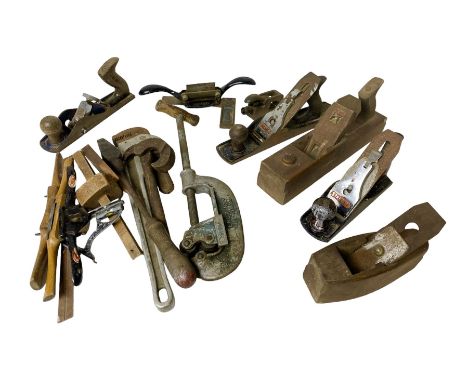 Collection of woodworking planes and other vintage tools, including Stanley and Salmans examples