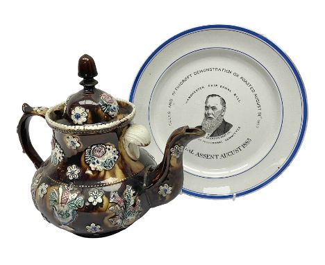 Victorian ceramic Barge Ware teapot, decorate di relief with flowers and thistles, inscribed Miss M E Whittaker Manchester 18