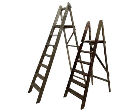 Early 20th century red painted pine step ladder, six tread (W50cm H150cm); with another similar (W49 H187)