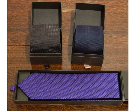 Patek Philippe - Three silk ties. In original boxes (3).