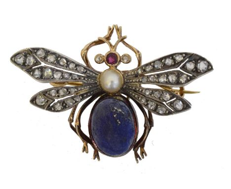 A gem-set bug brooch. With blue enamel body and split pearl abdomen, ruby head, and rose cut diamond eyes and wings, with det