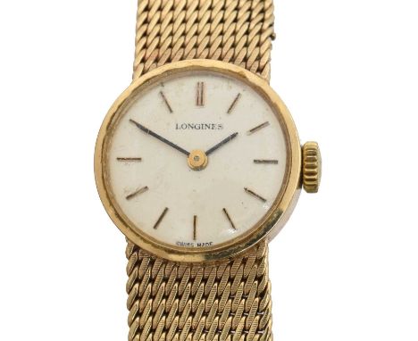 A 1970s 9ct gold Longines manual wind wristwatch. The signed dial with baton markers, signed cal. 5602 17 jewel manual wind m